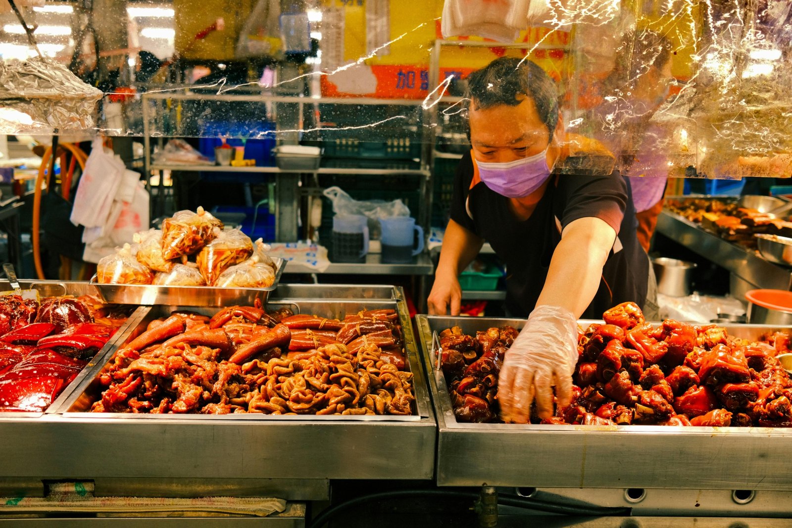 Happy traveler enjoying local street food, representing authentic and affordable travel experiences in the cheapest countries to explore.