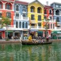 Historic European city street scene representing affordable travel destinations like Lisbon, Prague, Budapest, and Krakow for budget-friendly vacations.