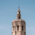 A stunning view of a famous Spanish landmark, like Seville's Plaza de España, on a bright sunny day, illustrating a guide to the best cities to visit in Spain in 2025.