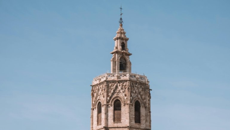 A stunning view of a famous Spanish landmark, like Seville's Plaza de España, on a bright sunny day, illustrating a guide to the best cities to visit in Spain in 2025.