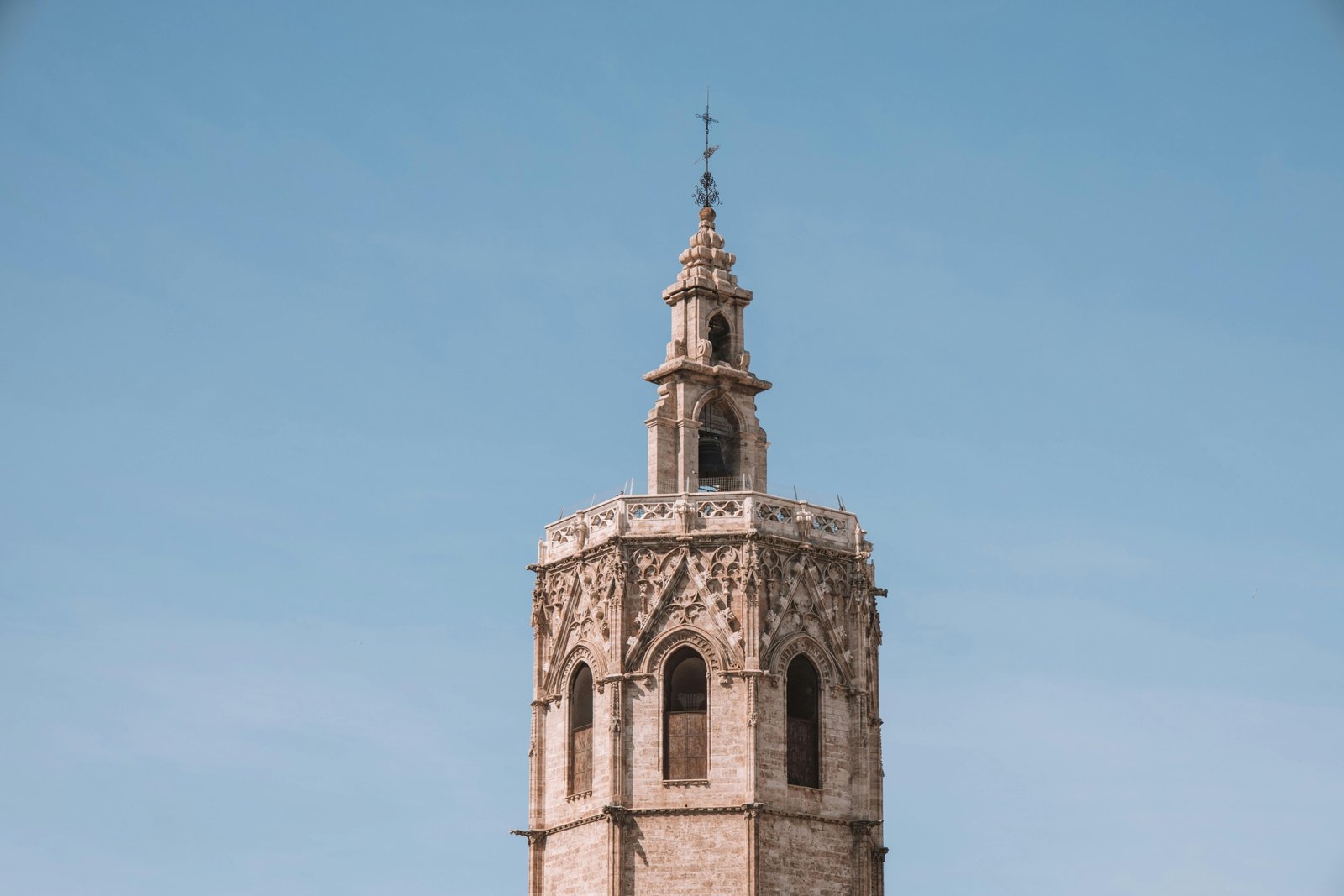 A stunning view of a famous Spanish landmark, like Seville's Plaza de España, on a bright sunny day, illustrating a guide to the best cities to visit in Spain in 2025.