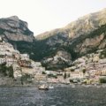 A scenic view of a colorful coastal village, one of the many beautiful holiday destinations in Europe discussed in the article.