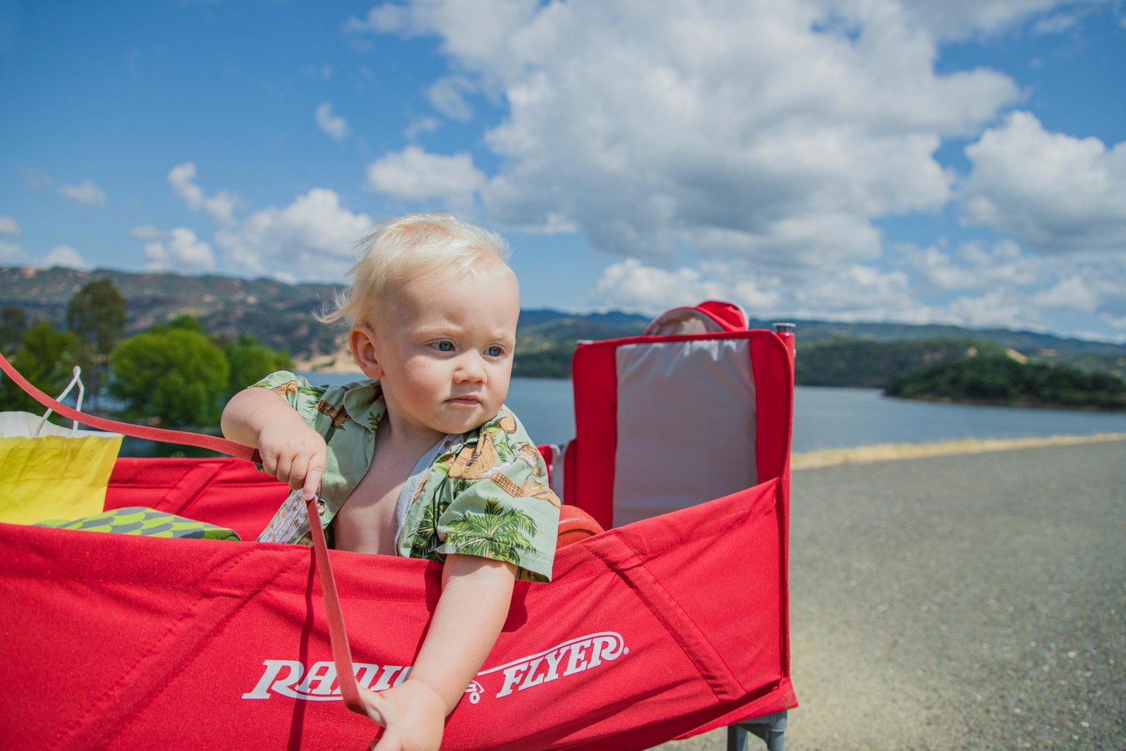 Best travel cot for baby: happy family on vacation with baby sleeping safely in a portable crib for comfortable travel.