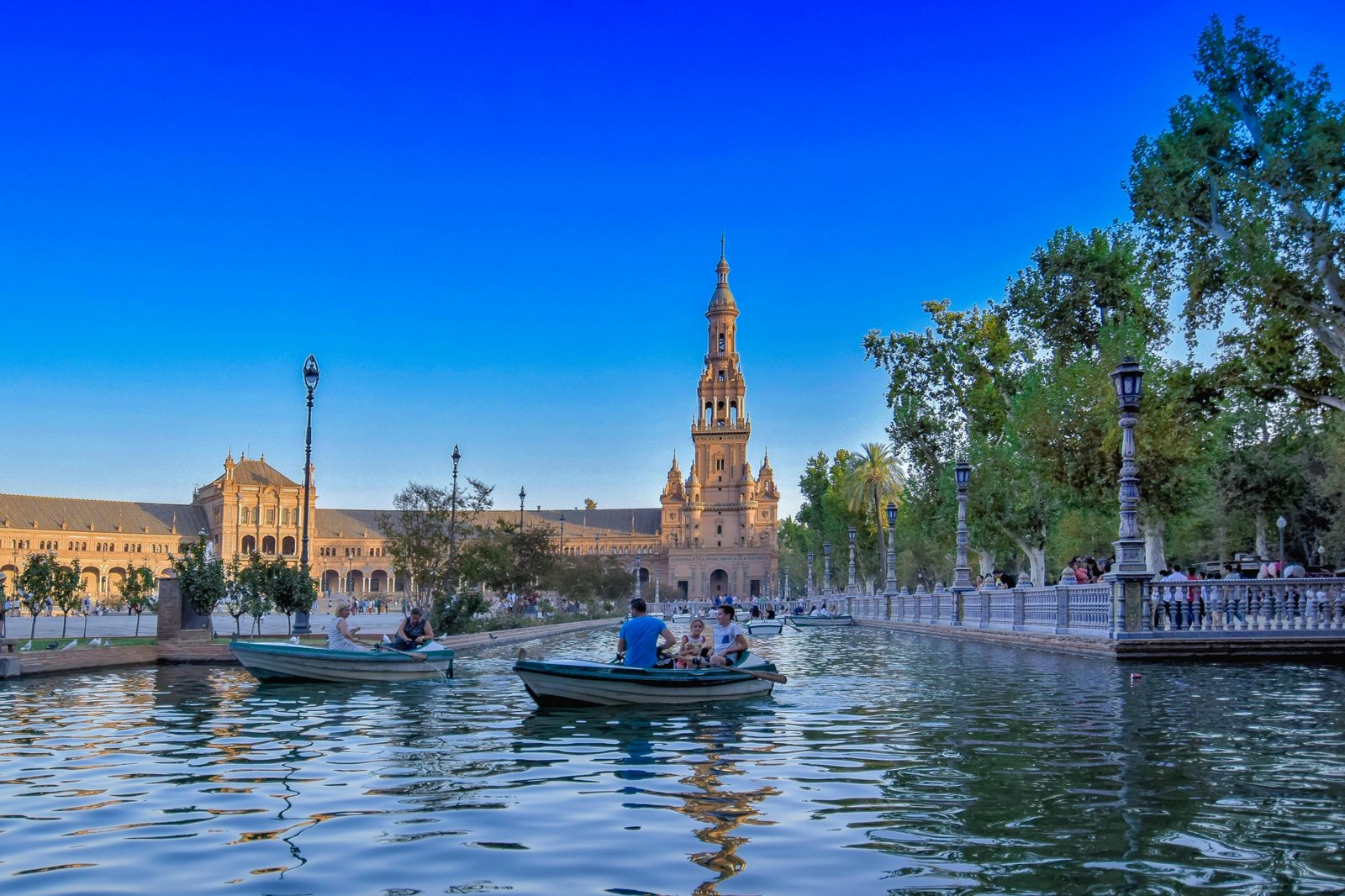 A wide, sunny view of the magnificent Plaza de España in Seville, a key highlight in a 10-day Spain travel itinerary.