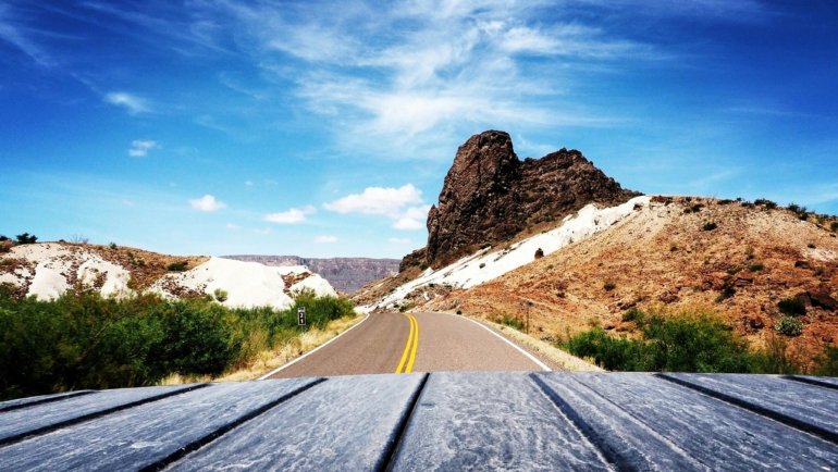 A scenic view of the rolling landscape of the Texas Hill Country, showcasing one of the many beautiful things to do near San Antonio.