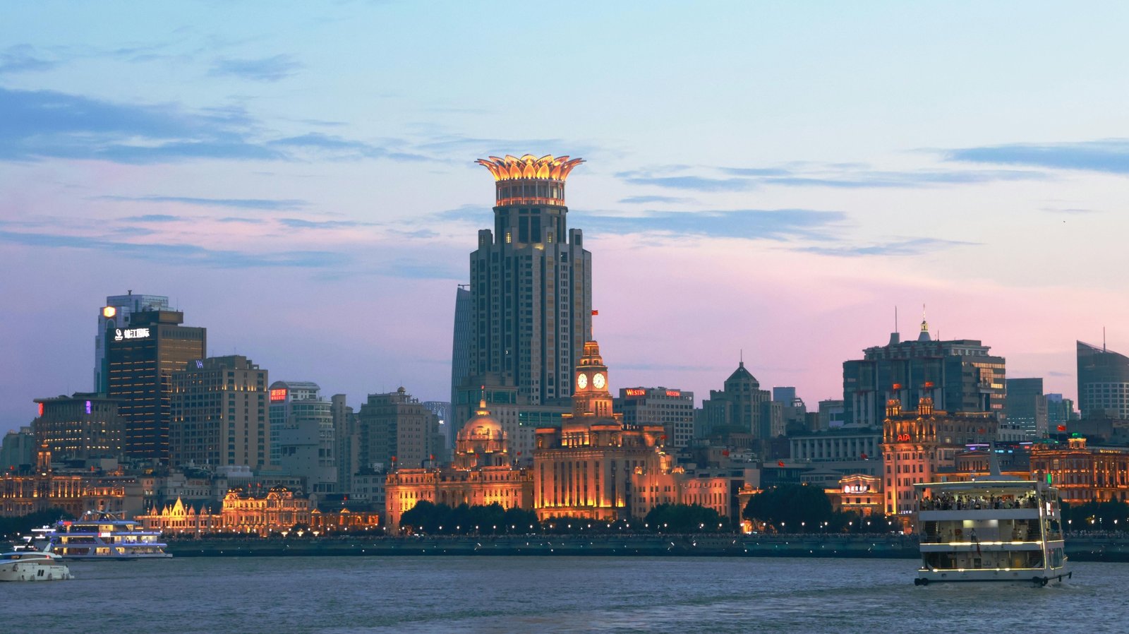 The dazzling Pudong skyline viewed from The Bund at night, featuring the illuminated Oriental Pearl Tower, a must-see sight for anyone visiting Shanghai in 2025.
