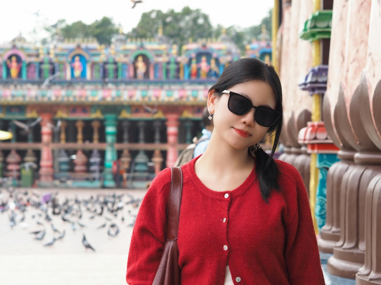 A confident travel nurse with a backpack overlooking a vibrant city, symbolizing the adventure, flexibility, and professional growth of cross-country travel nursing.