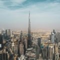 Dubai modern cityscape with iconic landmarks, featuring essential travel tips for first-time visitors.