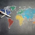 A backpacker enjoys a vibrant, culturally rich destination, illustrating the accessibility of cheap places to travel and inspiring budget-friendly world adventures.