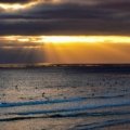Scenic South Padre Island beach in Texas featuring vibrant blue waters and golden sand, ideal for a family vacation in 2025, highlighting new attractions and experiences.