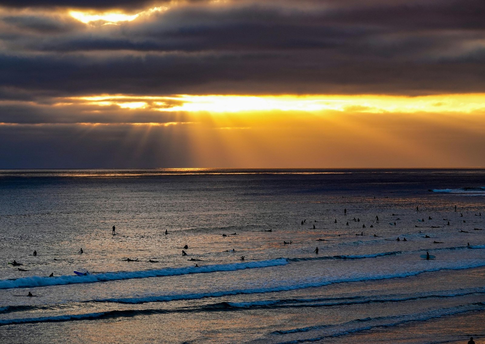 Scenic South Padre Island beach in Texas featuring vibrant blue waters and golden sand, ideal for a family vacation in 2025, highlighting new attractions and experiences.