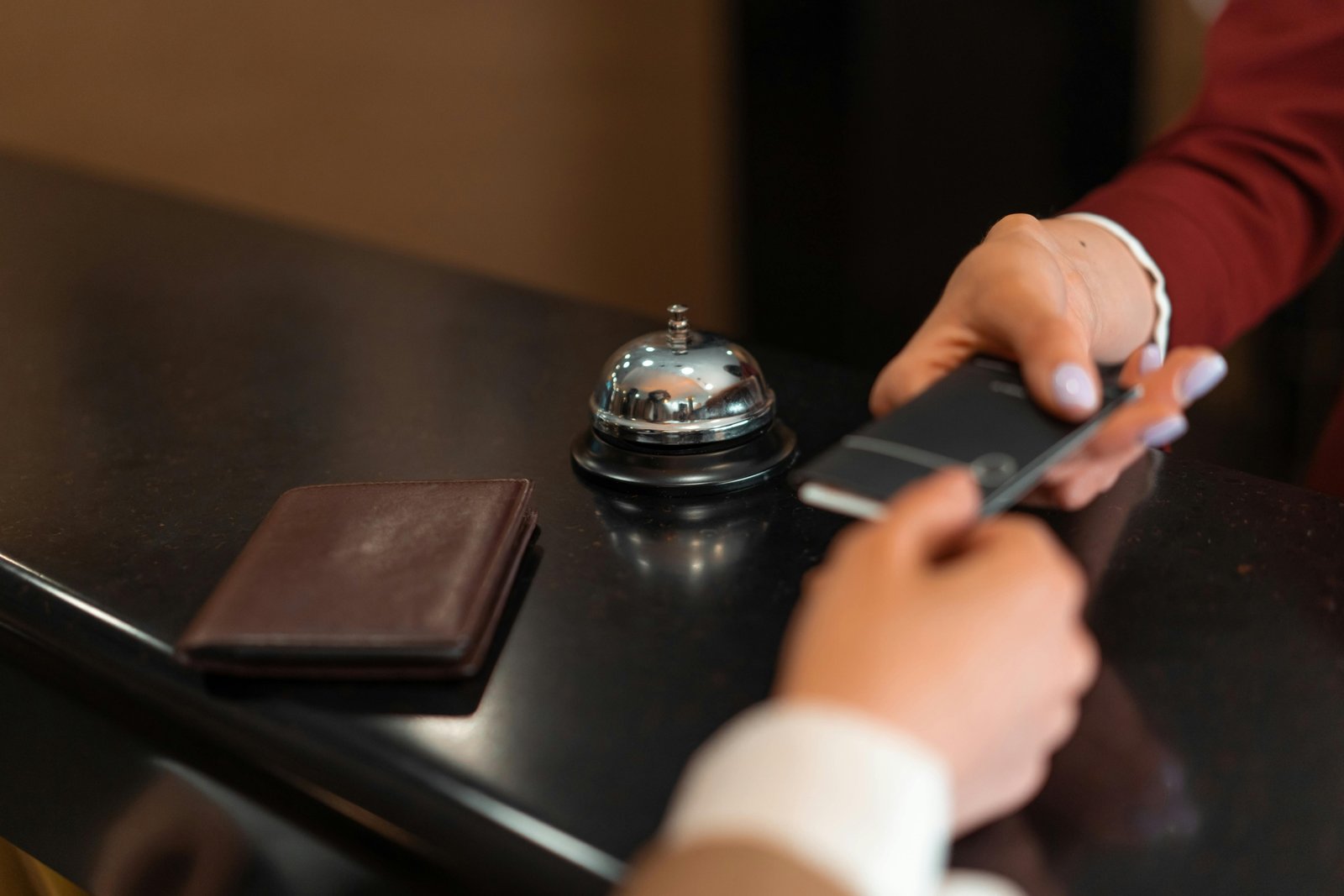 Happy person using a laptop to find and book discounted hotel deals online, symbolizing smart budget travel planning and significant savings on accommodation.