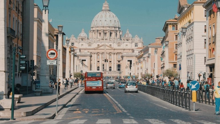 A dense crowd of tourists overwhelming a famous European landmark, illustrating one of Europe's most overcrowded tourist spots.