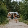 Happy person enjoying an affordable adventure made possible by budget travel hacks.