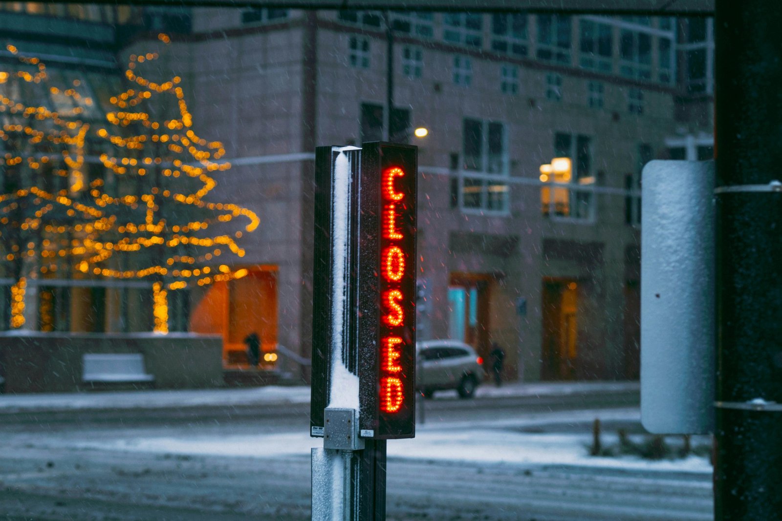 Snow-covered road in Buffalo, NY, during a severe winter storm and mandatory travel ban, highlighting the extreme conditions and importance of public safety.