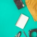Organized travel packing essentials for a stress-free vacation, featuring a flat lay of tech gadgets, comfort items, and smart packing solutions for a memorable trip.