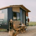 Top rated travel trailer for luxurious road trips and family adventures, parked in a scenic natural landscape, symbolizing freedom and comfort on vacation.