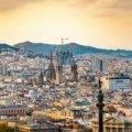 Madrid vs Barcelona travel comparison: iconic landmarks representing the choice between Spain's capital and its Catalan gem for a perfect 2025 vacation.