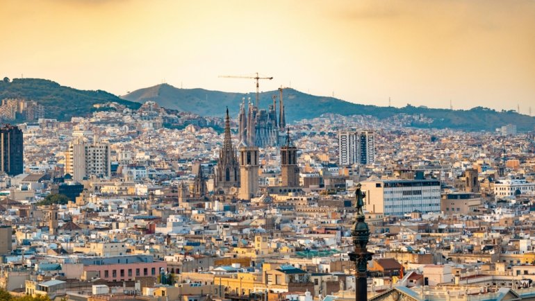 Madrid vs Barcelona travel comparison: iconic landmarks representing the choice between Spain's capital and its Catalan gem for a perfect 2025 vacation.