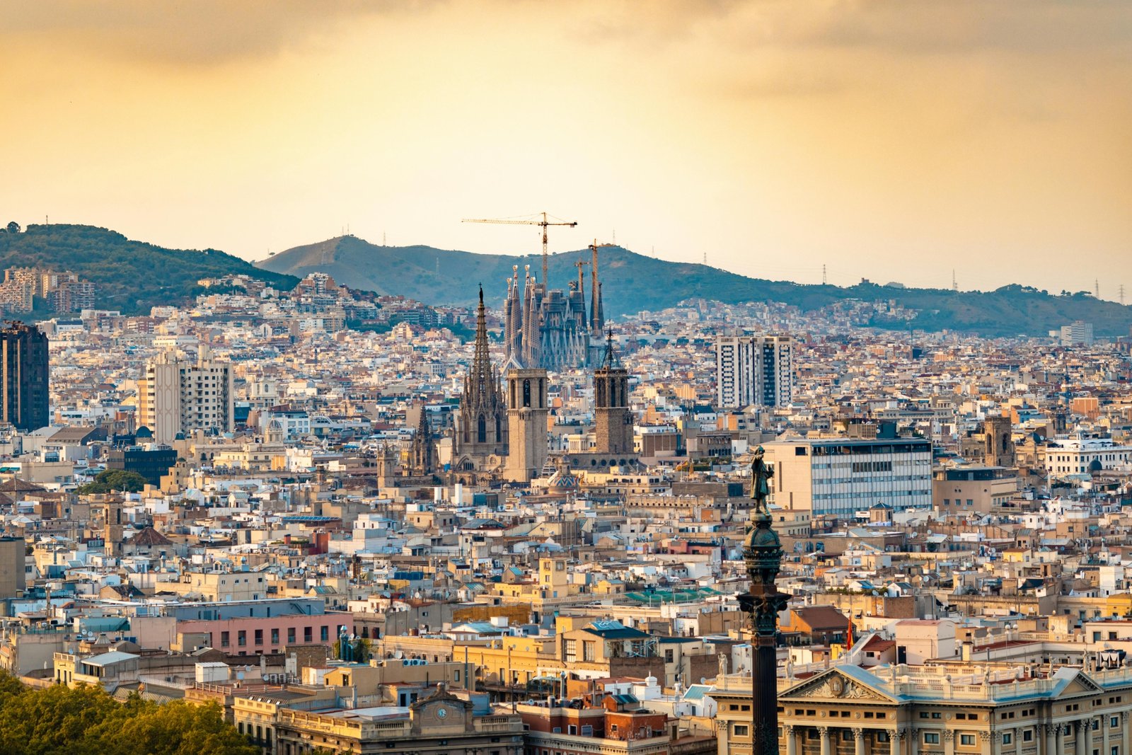 Madrid vs Barcelona travel comparison: iconic landmarks representing the choice between Spain's capital and its Catalan gem for a perfect 2025 vacation.