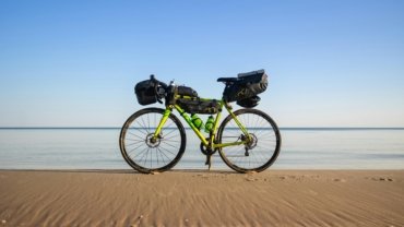 OGIO Rig 9800 heavy-duty wheeled travel bag for adventure sports, motocross, skiing, and expedition gear with SLED system.