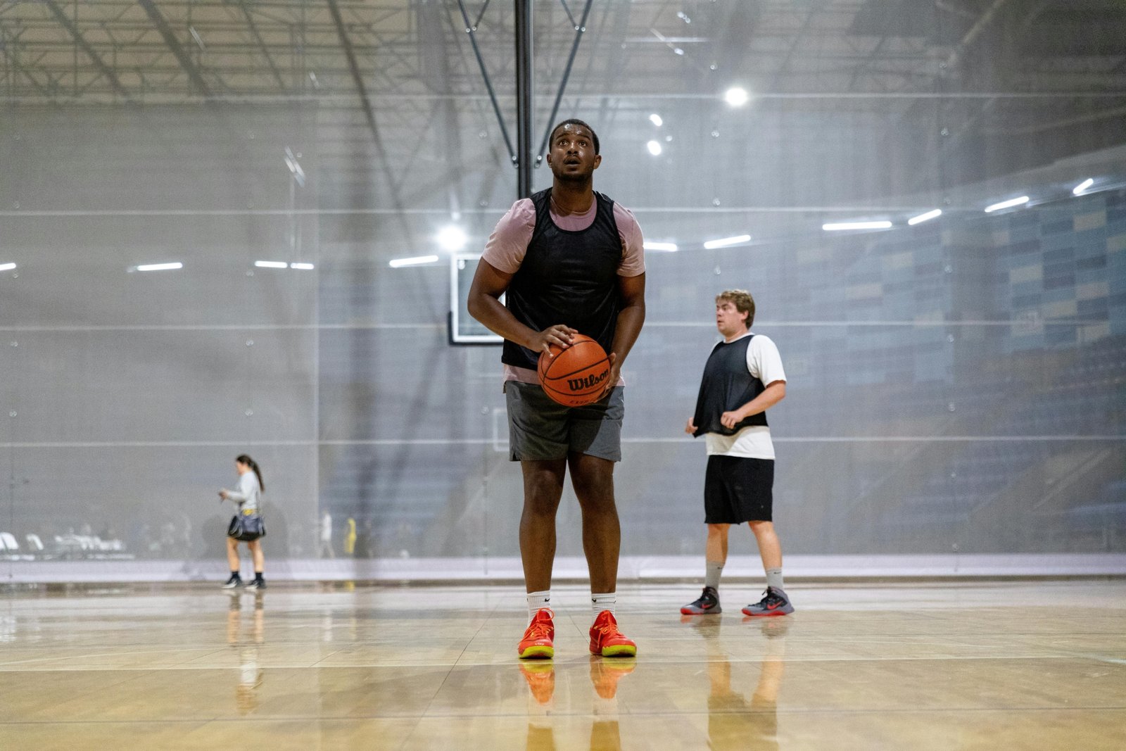 Competitive youth travel basketball team practice with young players developing skills and teamwork, preparing for AAU club tryouts and tournaments.