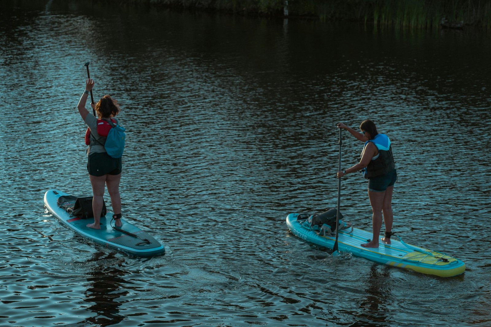 The WanderFit Sisters, Alex and Chloe, inspiring healthy travel, fitness, and wellness while exploring a scenic destination.