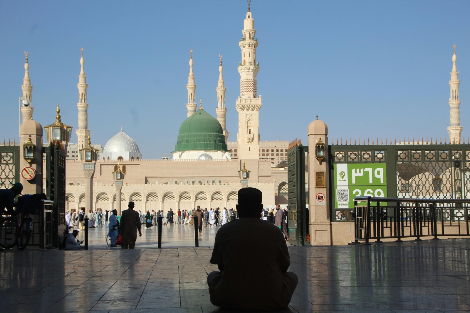 Muslim person reciting dua for travelling, seeking divine protection and peace of mind for a safe journey, reflecting faith and gratitude.