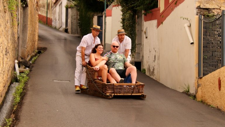 Traveler happily planning an authentic cultural adventure, utilizing smart tips to create a memorable and enriching travel experience.
