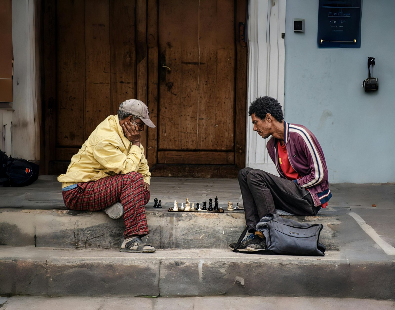 Politicser.com Pepperboy travel archives: A solo backpacker engaging with locals in an authentic, off-the-beaten-path destination, embodying budget-friendly adventure.