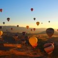 Overview of iconic Turkish travel destinations, featuring historical landmarks like Istanbul and ancient ruins, alongside unique landscapes such as Cappadocia's fairy chimneys.