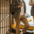 Stylish man wearing Banana Republic Traveler Pants, showcasing their versatile slim fit, comfort, and suitability for modern urban, travel, and smart-casual settings.