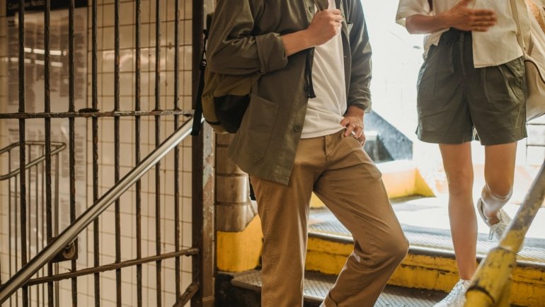 Stylish man wearing Banana Republic Traveler Pants, showcasing their versatile slim fit, comfort, and suitability for modern urban, travel, and smart-casual settings.