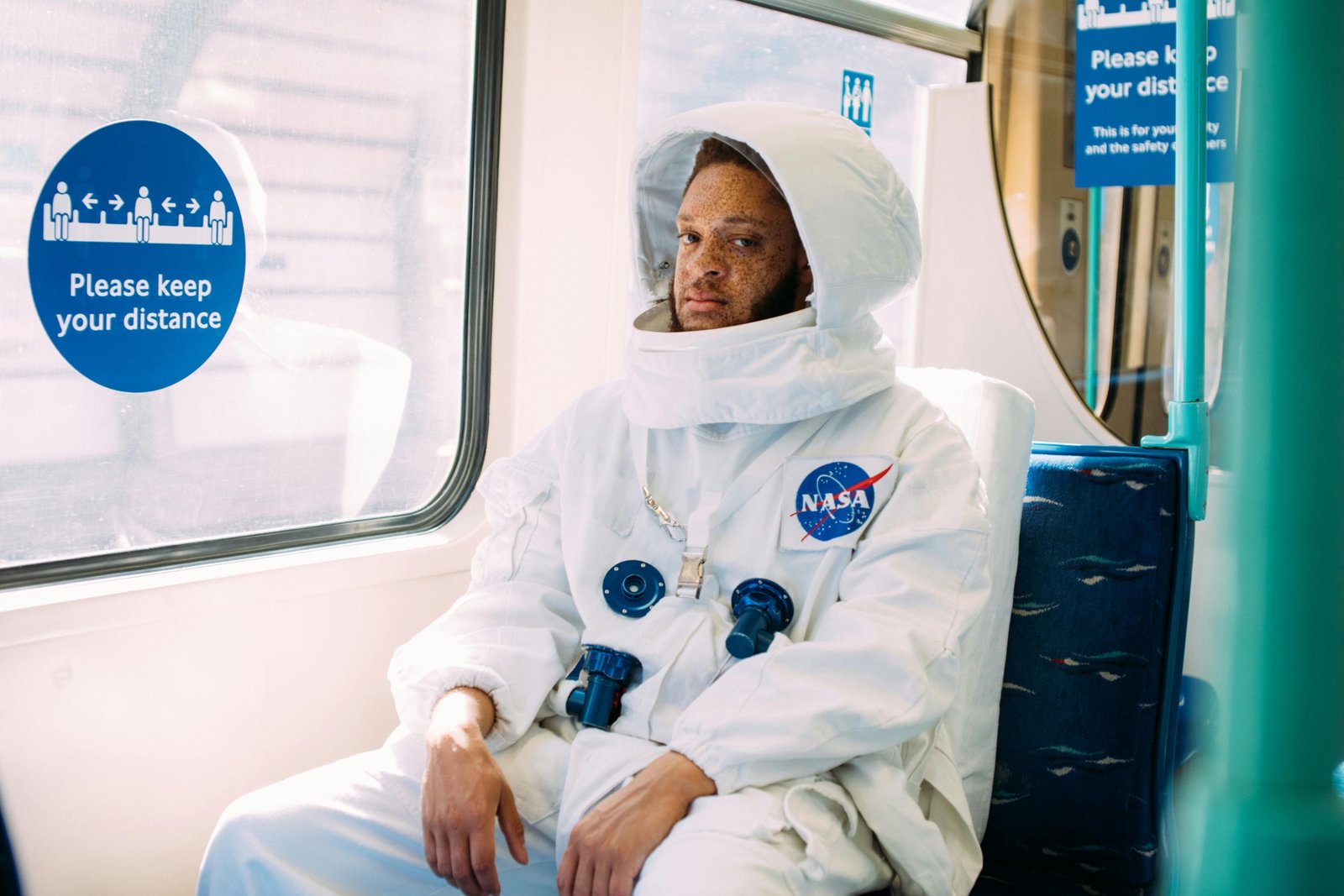 Traveler laughing at a relatable travel mishap, symbolizing the universal humor and shared experiences celebrated in travel memes.