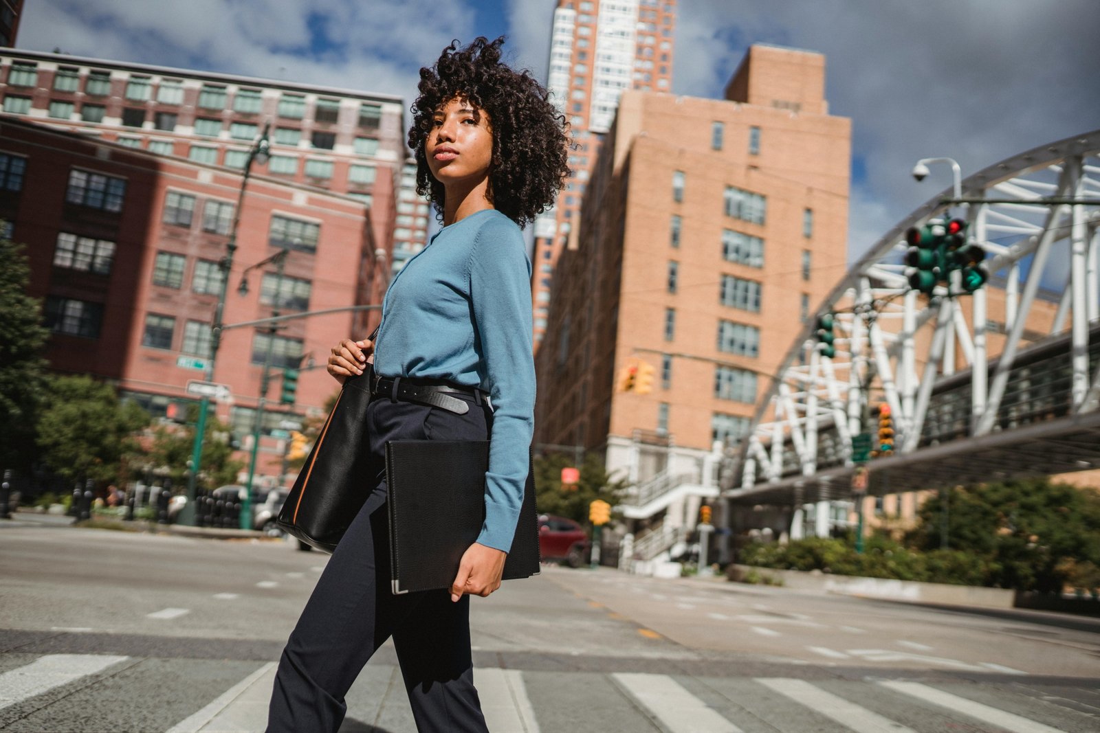 A professional certified surgical technologist (CST) confidently looking at a dynamic city skyline, symbolizing the career growth, high earning potential, and travel adventure offered by surgical tech travel jobs.