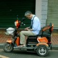 Go Go Elite Traveler portable mobility scooter providing independence and freedom for a senior person traveling or navigating daily life.