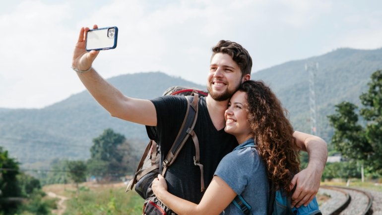 Happy traveler enjoying the scenic vineyards of Moldova with peace of mind, symbolizing comprehensive travel insurance protection for a worry-free Eastern European adventure.