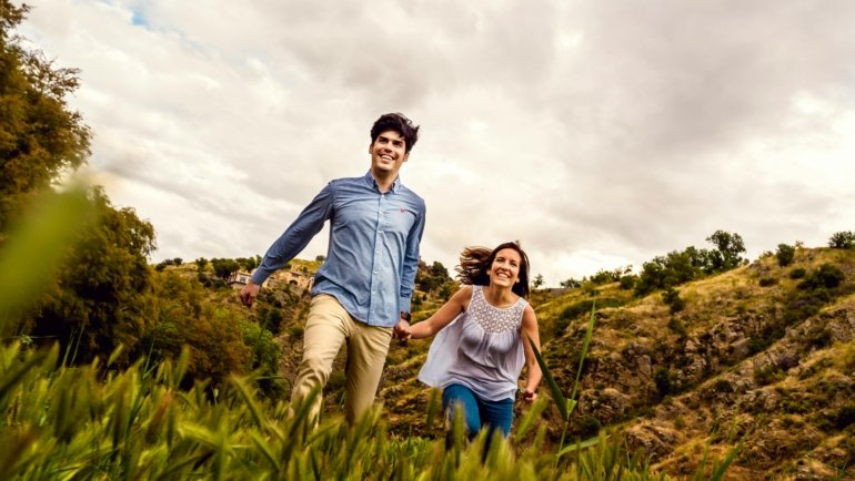Joyful traveler enjoying a stress-free Spanish vacation, highlighting the convenience and expert planning offered by Spain travel packages for a memorable 2025 adventure.