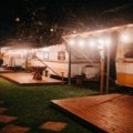 Best rated travel trailer parked in a scenic mountain landscape, ready for a comfortable and adventurous road trip.