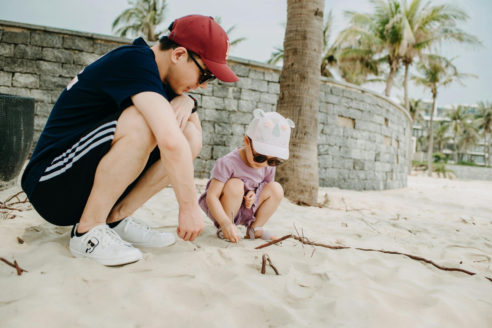 Professional travel nanny playing with happy children at a family-friendly resort, enabling parents to enjoy a relaxing and stress-free vacation.