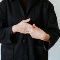 Hands demonstrating the ASL sign for 'travel' in American Sign Language, symbolizing visual communication for journeys and global exploration within the deaf community.