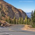 Scenic view of the majestic Rocky Mountains in Colorado, symbolizing diverse natural beauty and year-round adventures for travelers.