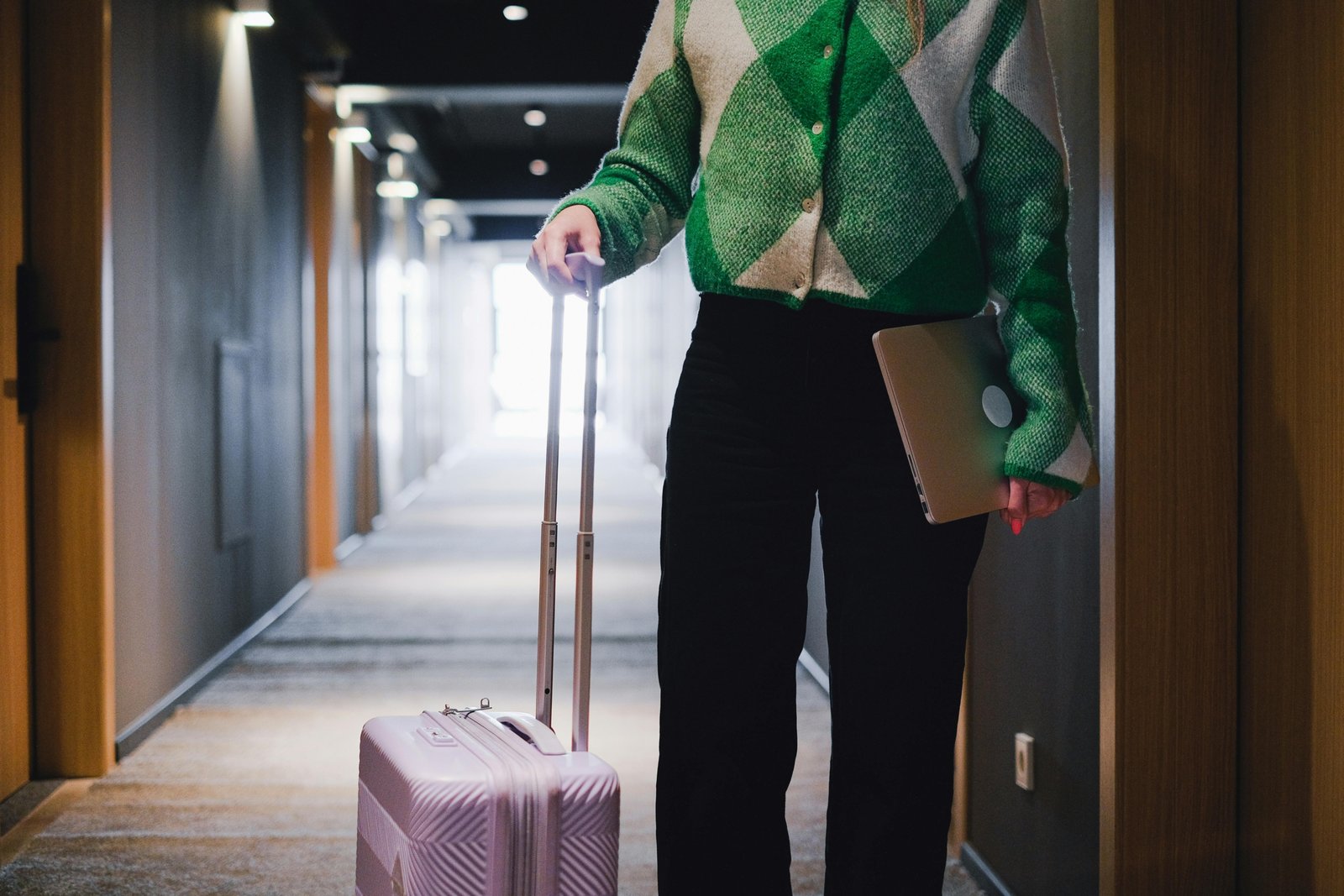 Professional travel agent booking and enjoying IHG luxury hotel personal trip with discounted rates.