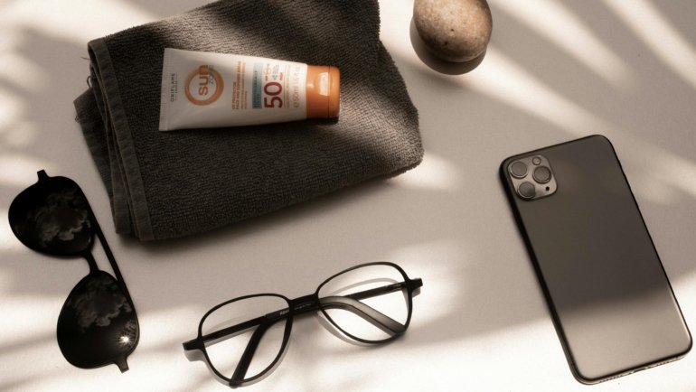 Travel size sunblock essential for TSA-friendly carry-on luggage, ensuring sun protection for beach and city vacations.