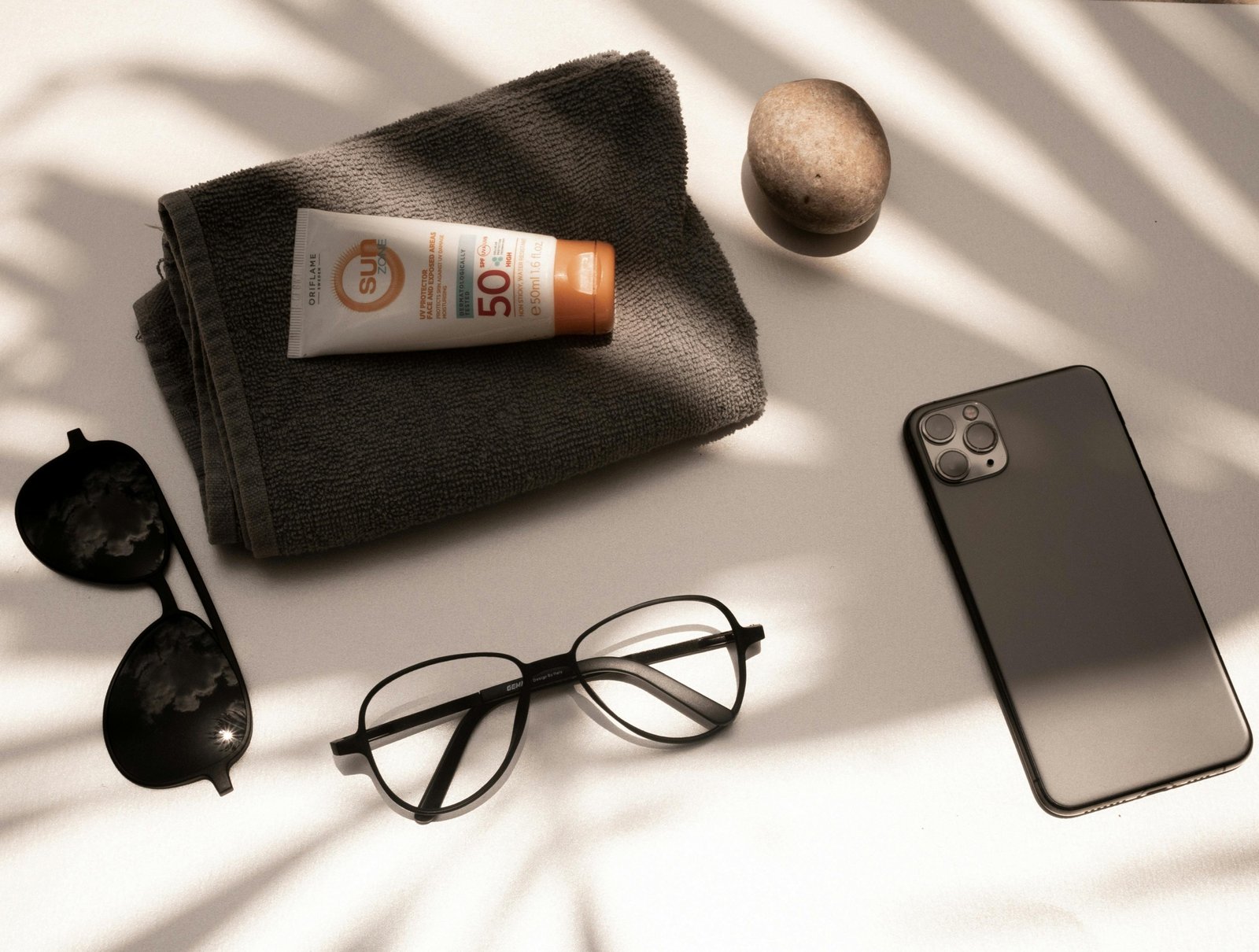 Travel size sunblock essential for TSA-friendly carry-on luggage, ensuring sun protection for beach and city vacations.