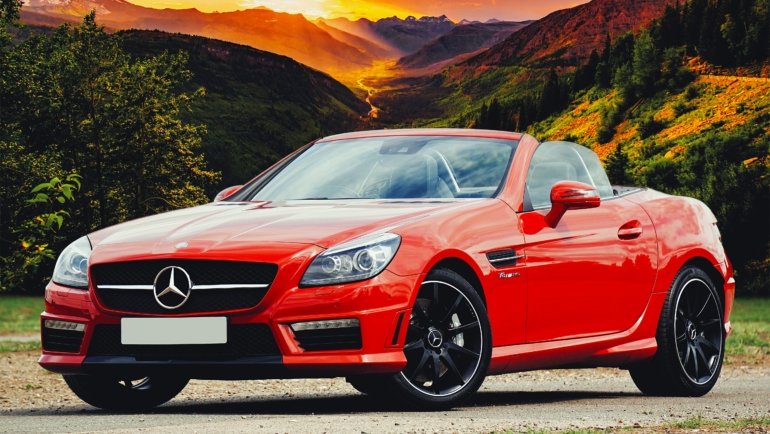 A sleek Alliance Delta travel trailer showcasing luxury features, set against a stunning natural backdrop, perfect for comfortable and adventurous road trips.