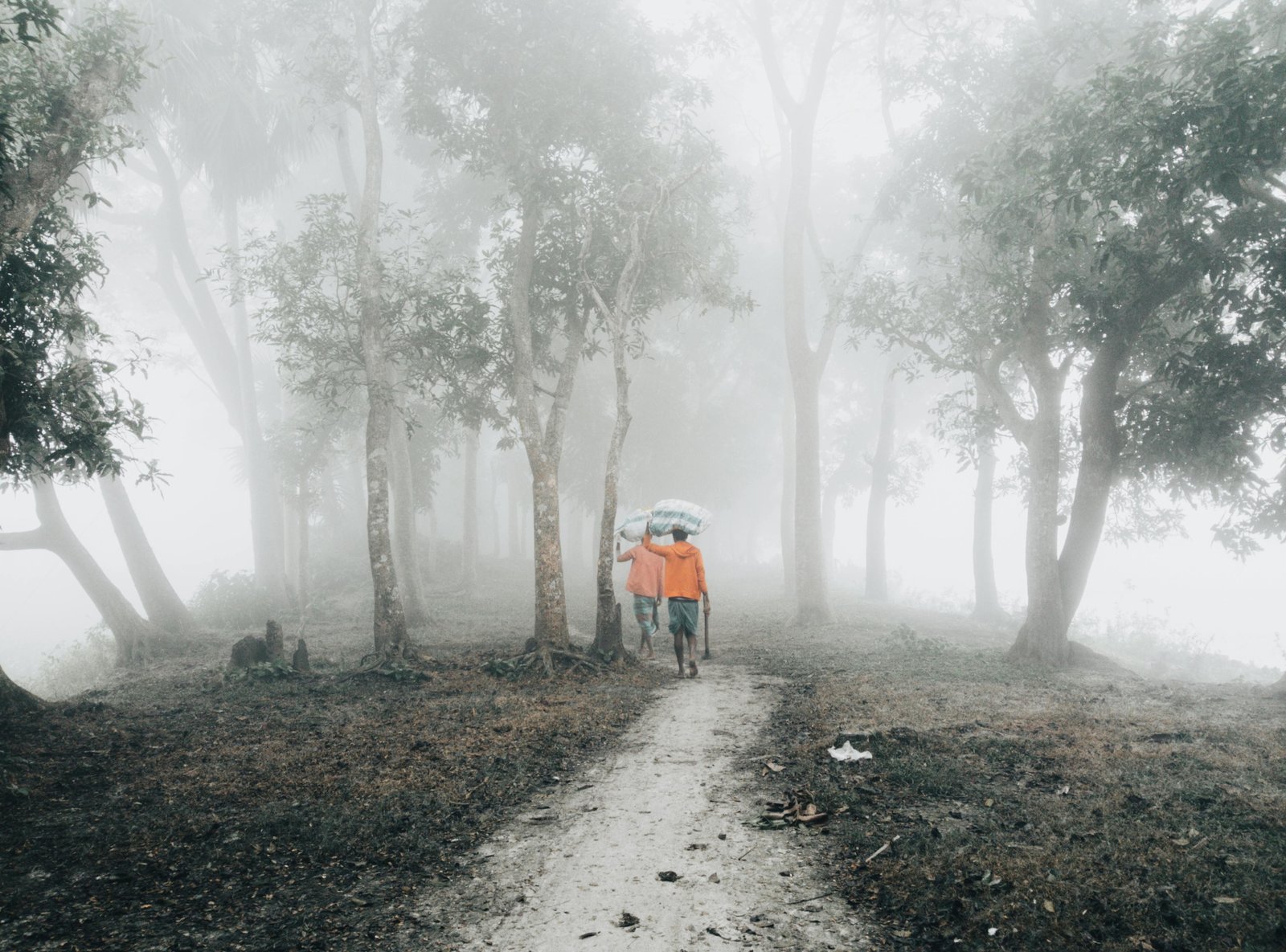 Traveler applying portable travel size mosquito repellent for essential insect protection during a tropical trip, ensuring comfort and safety.