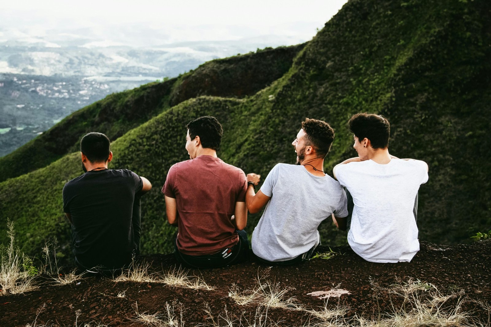 A diverse group of happy friends exploring a scenic destination, illustrating the joy of finding perfect travel mates for an unforgettable group adventure.