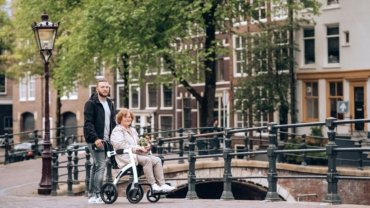 Patient preparing for a medical journey with a sense of relief, symbolizing patient travel subsidy and financial assistance for healthcare access and specialized treatment.