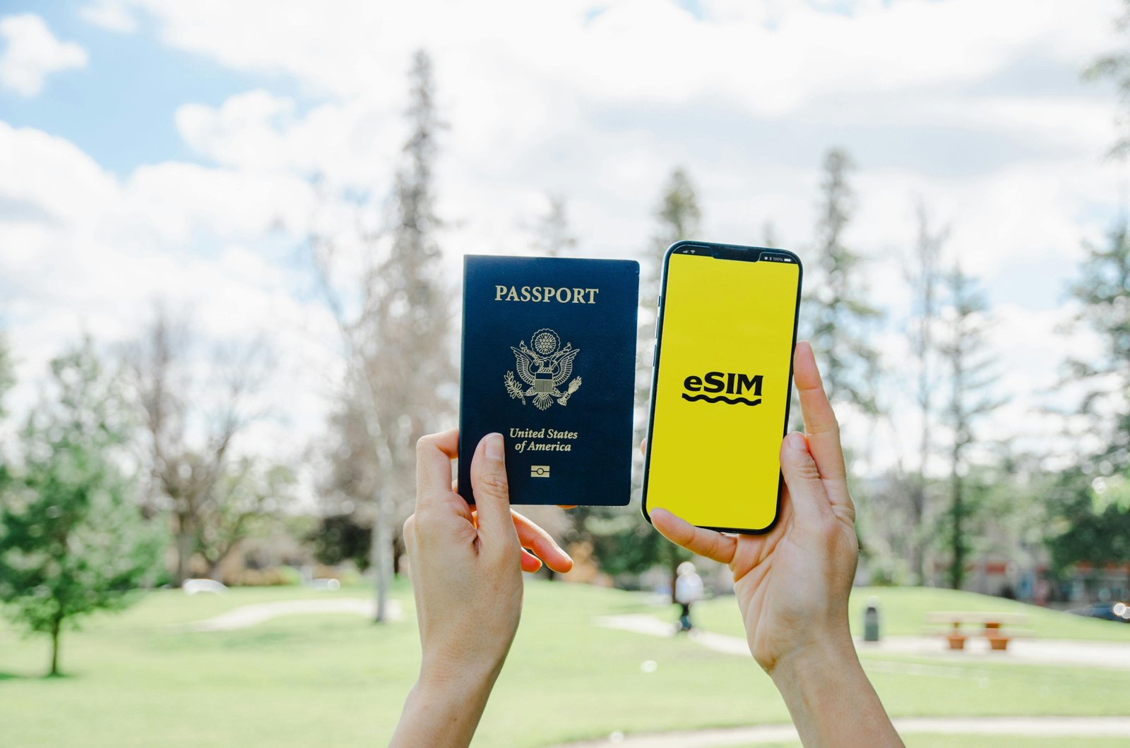 Traveler holding a smartphone with a world map, representing automatic Verizon Travel Pass activation for seamless international phone use and global connectivity.